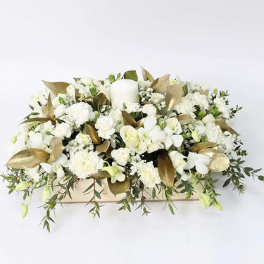 Feast Table Elegance, Stunning Floral Arrangement, White Baby Roses, White Carnations, White Baby Carnations, White Orchids, Gypso, Parvifolia, Golden Sprayed Single Ruscus, White Candle, Wooden Box, Centertable Arrangement